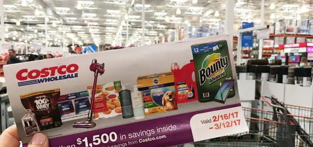 February 2017 Costco Coupon Book Cover Held